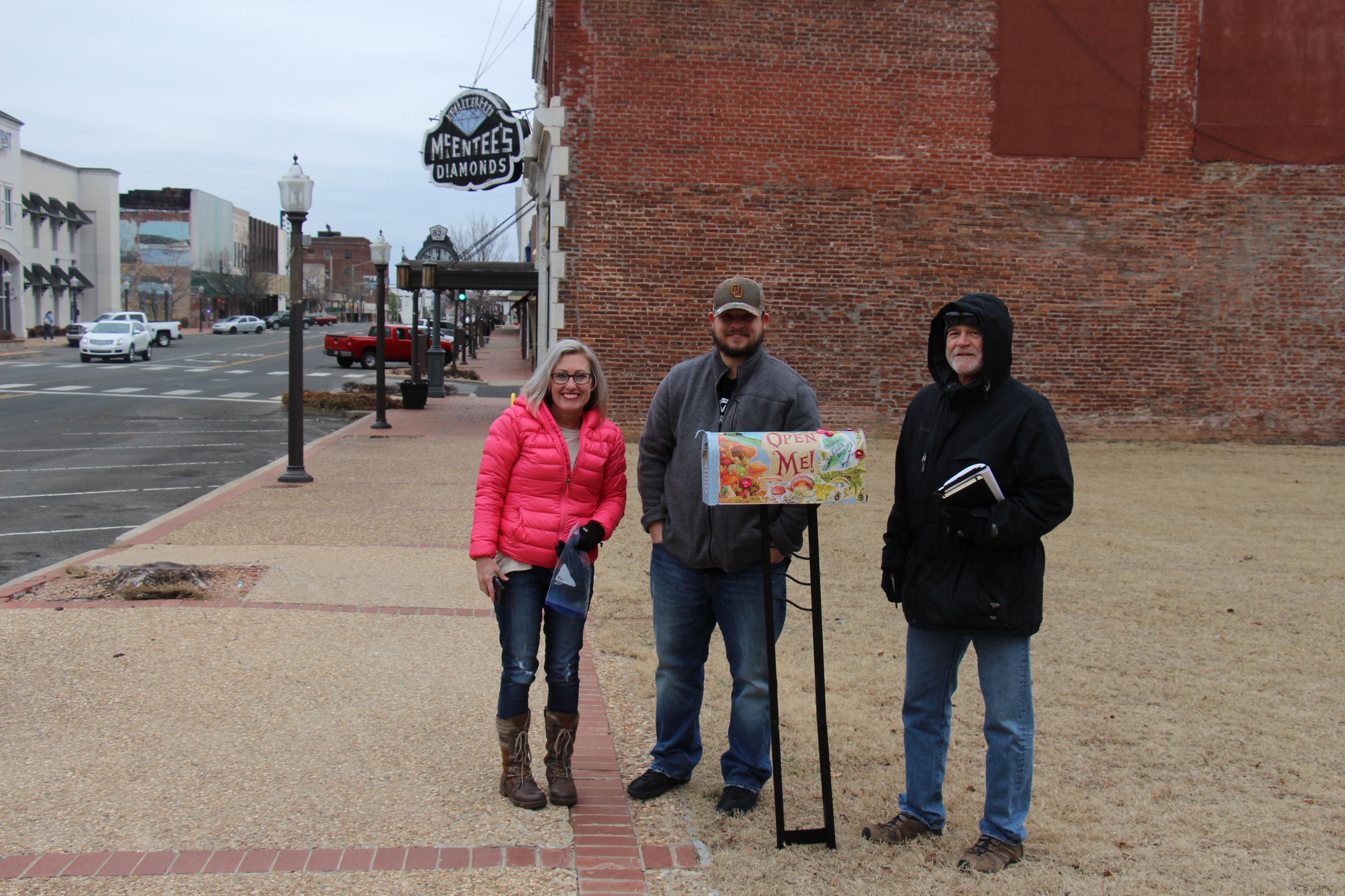 Robi, Kyle, and Greg standing by the artsy idea box for the Muskogee Green. Robi, Kyle, and Greg standing by the artsy idea box for the Muskogee Green.